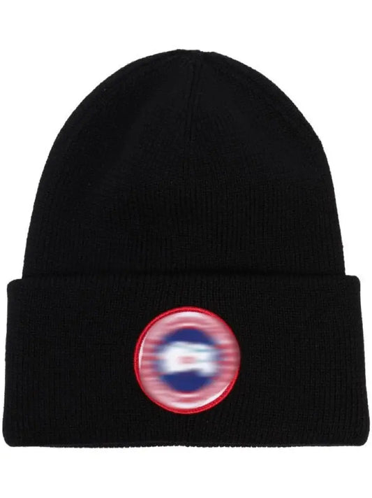 Men's beanie "CG" by Dawens Store, soft knit fabric in a stylish fit, shown on a model's head with a folded brim and casual look.